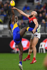 Max Gawn wins a hit-out against West Coast’s Nic Naitanui.