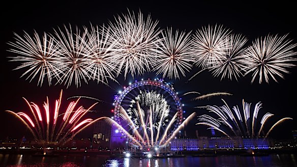 Fireworks are launched from the London Eye by the River Thames in London.