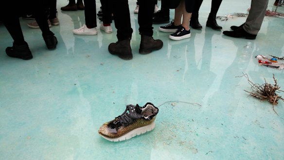 Visitors stand at the Deep See Blue Surrounding You installation by artist Laure Prouvost, at the French pavilion.