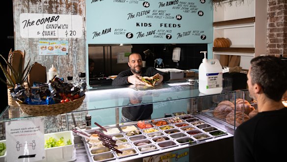 Dan Weinstein in his shop, Glenayr on Blair, in Bondi. He is one of a number of small business owners who have been affected by Covid-19 who are entering a raffle for a chance to have their branding on Sonny Bill William's Roosters jersey.