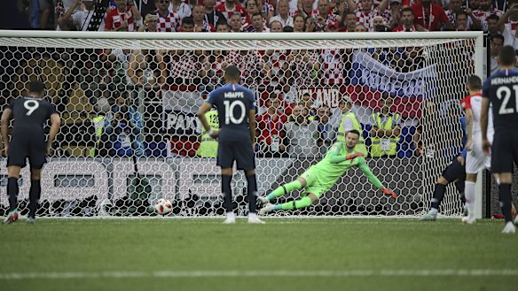 Antoine Griezmann's penalty beats Croatia's keeper Danijel Subasic.