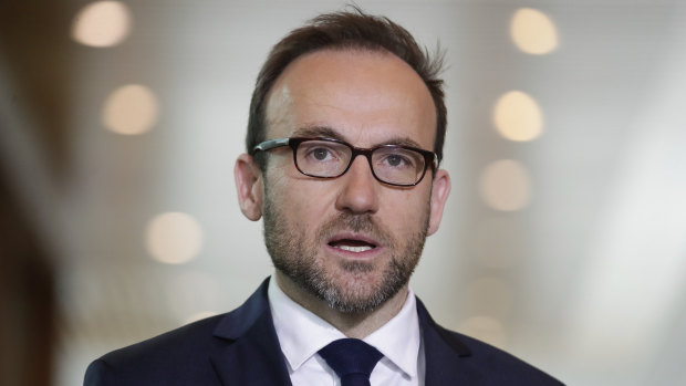 Greens leader Adam Bandt says cutting wage subsidies in favour of tax cuts is "trickle-down brutality".