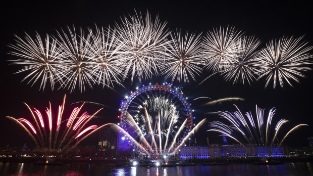 Fireworks are launched from the London Eye by the River Thames in London.