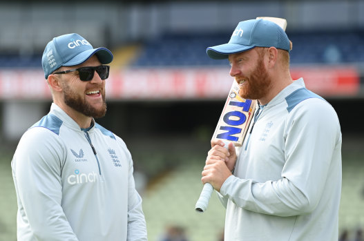 England coach Brendon McCullum chats with the in-form Jonny Bairstow.
