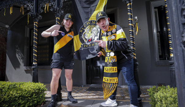 Tigers fever hits the streets of Richmond. George and Peter Vamvakitis outside their home.