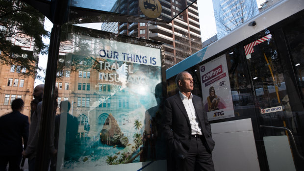 JCDecaux CEO Steve O'Connor next to a bus stop. The decision by the City of Sydney will see inventory like this disappear.