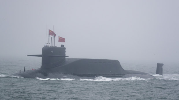 A new type 094A Jin-class nuclear submarine Long March 10 of the Chinese People’s Liberation Army (PLA) Navy participates in a naval parade in 2019.