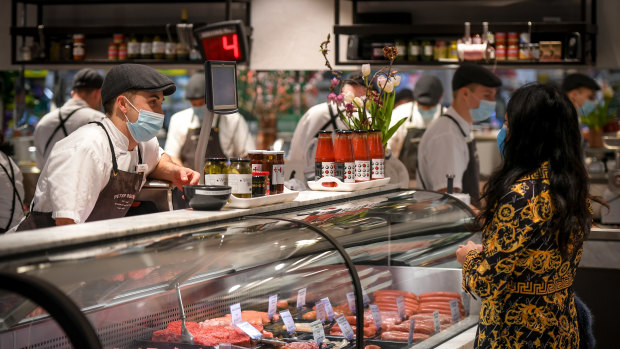 Tom Bouchier serves a customer at his Peter Bouchier Butchers in Malvern Central.