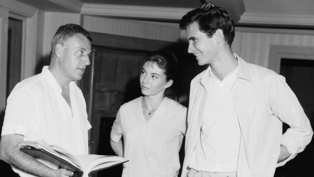 Young stars Anthony Perkins and Donna Anderson rehearse under the watchful eye of director Stanley Kramer.