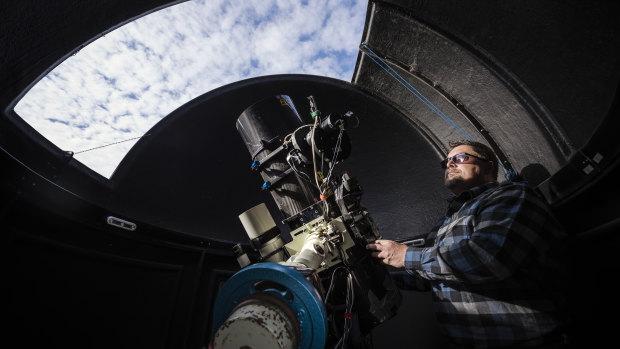Michael Sidonio at Terroux Observatory, which houses a 30 centimetre telescope in the dome just outside of Canberra.