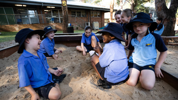 Students at Thornleigh West Public School's before-school care program. The outside school hours care sector has been hit hard during the pandemic as many parents work from home.