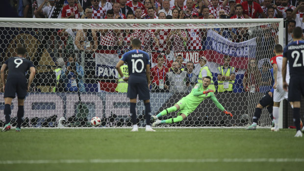 Antoine Griezmann's penalty beats Croatia's keeper Danijel Subasic.