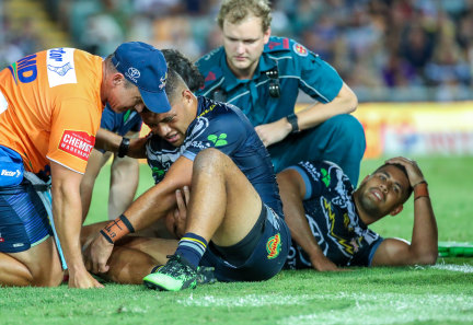 Cowboys duo John Asiata (left) and Nene Macdonald after they collided in a game in April.