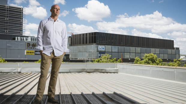 Nick Parkinson on the rooftop he plans to turn into a bar in Garema Place.
