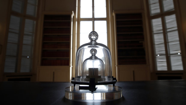 A replica of the International Prototype Kilogram   at the International Bureau of Weights and Measures, in Sevres, near Paris. 
