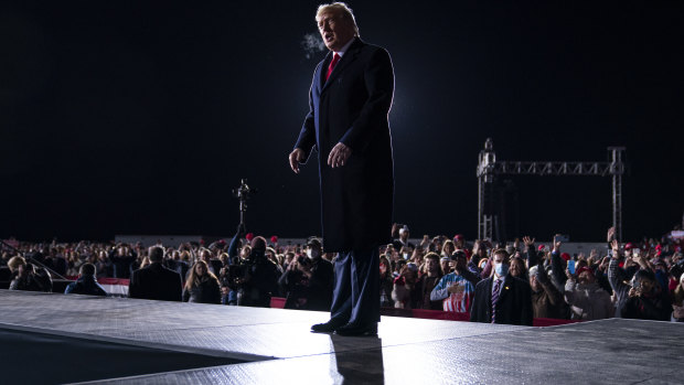 President Donald Trump arrives to speak at a campaign rally for Sen. Kelly Loeffle and David Perdue.