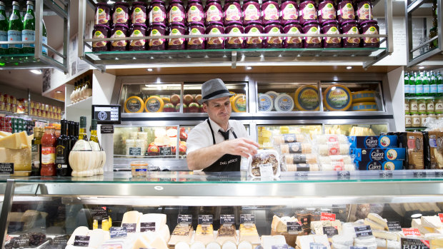 Deli owner Rocco Barbaro, had to rely on the old methods of pen and paper to complete transactions during the blackout.