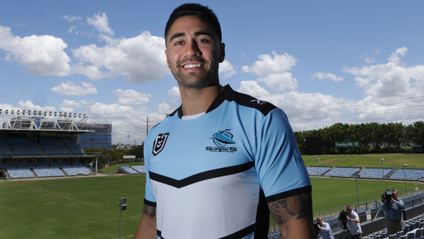 Shark sighting: Shaun Johnson tries on his new colours at Southern Cross Group Stadium on Thursday.