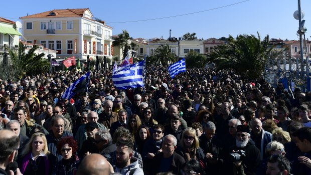 Protesters gather in Mytilene on Lesbos. Local authorities declared a 24-hour strike on two eastern Greek islands to protest against government plans to build new migrant detention camps there.