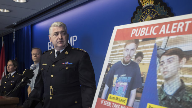 Security camera images recorded in Saskatchewan of Kam McLeod, 19, and Bryer Schmegelsky, 18, are displayed as RCMP Assistant Commissioner Kevin Hackett speaks at the beginning of the manhunt.