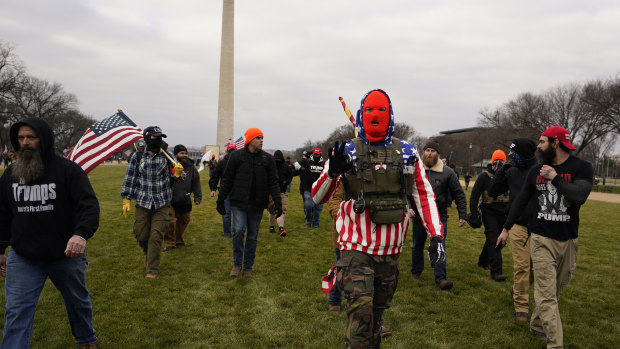 Out with the old: Proud Boys before the riot in Washington in January.