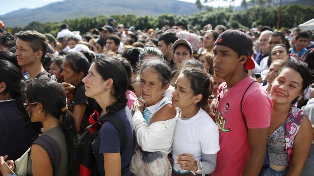  Venezuelans wait in line to cross into Colombia through the Simon Bolivar bridge in San Antonio del Tachira in 2016 at the start of the exodus.