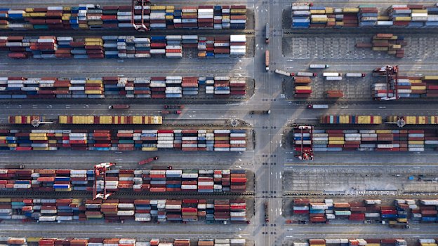 Cranes and containers at Yangshan Deepwater port in Shanghai in August.