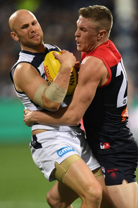 Gary Ablett is stopped in his tracks by Tom McDonald.
