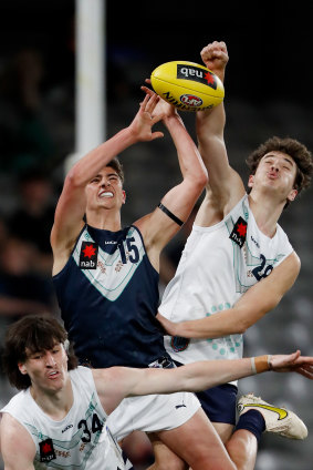 Harry Sheezel (left) playing for Vic Metro at the state championship at Marvel Stadium in September