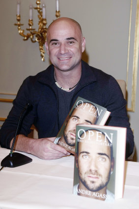 Andre Agassi  with his memoir Open.