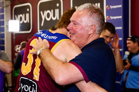 Lions skipper Harris Andrews and outgoing club CEO Greg Swann.