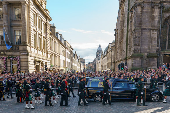 Tens of thousands turned up to watch the procession of the Queen’s coffin. 