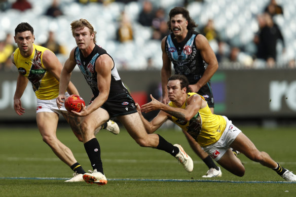 Jason Horne-Francis on the run for the Power in their win over the Tigers.
