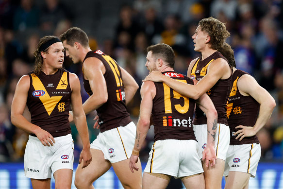 Hawks celebrate a goal.