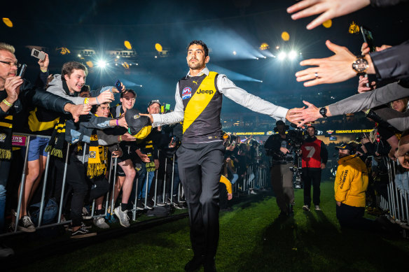 In the spotlight: New fan favourite Marlion Pickett celebrates after Richmond's flag win.