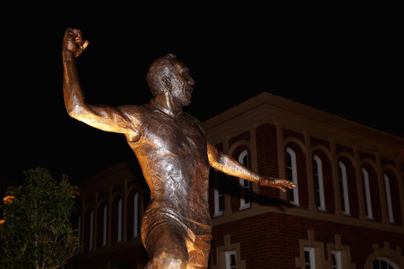 A statue of former Swans player Adam Goodes is seen outside Swans HQ.