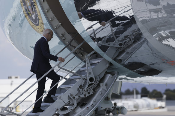 After testing positive for COVID-19, President Joe Biden boards Air Force One to depart Las Vegas.