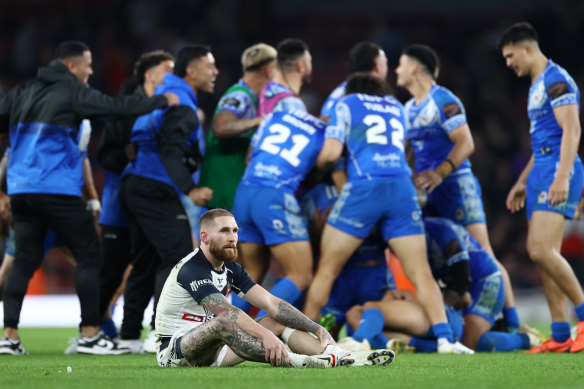 Samoa celebrates as England are crushed.