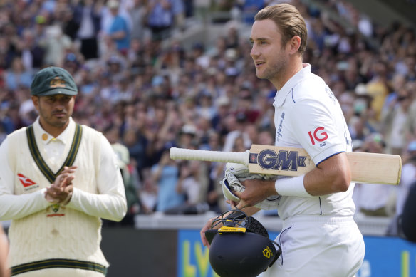 Stuart Broad walks out to bat for the final time.
