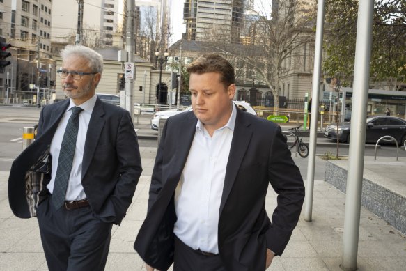 CFMEU national secretary Zach Smith (right) enters the Federal Court on Tuesday with his lawyer Josh Bornstein.