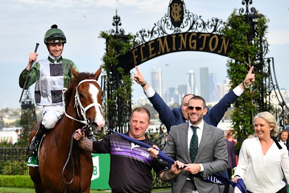 Brae Sokolski, right, leads Kings Will Dream back to the winners' stall after the Turnbull Stakes.