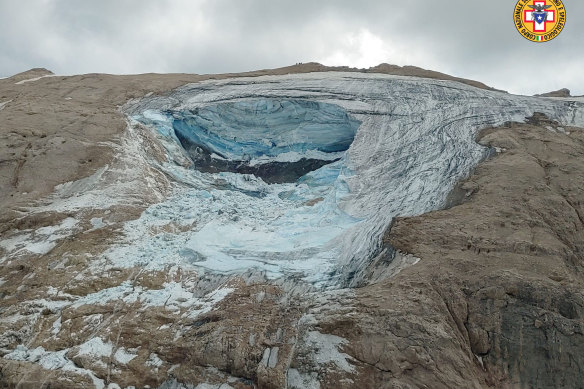 A large chunk of the glacier in Italy’s Alps near Trento in the Dolomite ranges broke loose, unleashing an avalanche that killed at least six hikers and injured eight others.