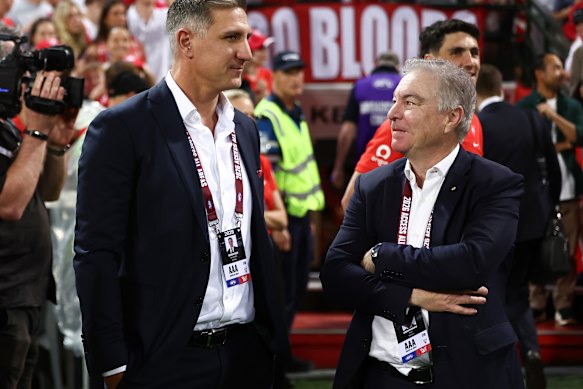 Matthew Pavlich with Swans chairman Andrew Pridham on Saturday.