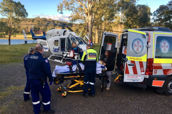 Paramedics treated the man before he was taken to hospital in a helicopter.   