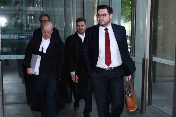 Bruce Lehrmann and his legal team leave the Federal Court in Sydney on Friday.