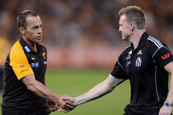 A younger Alastair Clarkson as Hawthorn coach in 2012. He is seen with Nathan Buckley.