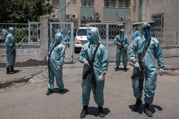 Palestinian police officers pictured last month during an operation to simulate a coronavirus outbreak in Gaza City.