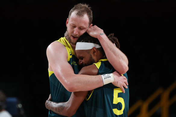 Joe Ingles and Patty Mills hug after winning the bronze medal game in Tokyo. Could they do it again in Paris?