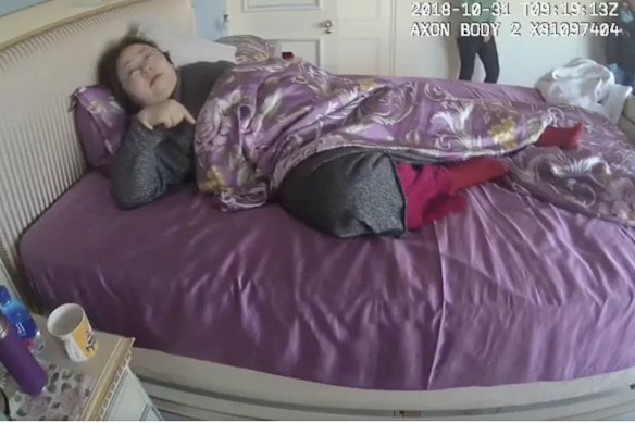 Zhimin Qian is caught by police for the first time at a house in Hampstead in 2018.