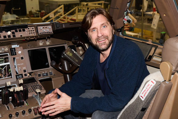 Swedish director Ruben Östlund in the cockpit of the plane he purchased for his film The Entertainment System is Down, coming to Stan.